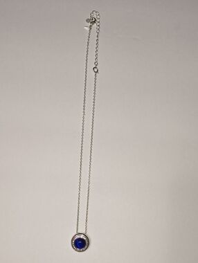 Dazzling Silver Necklace with Deep Blue Cabochon Pendant